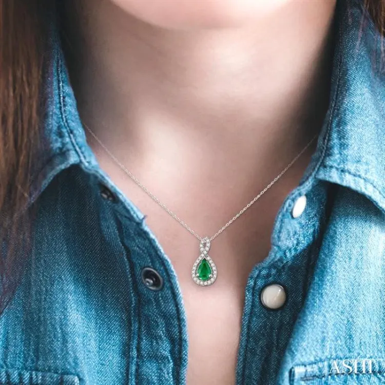 6x4MM Pear Shape Emerald and 1/10 Ctw Round Cut Diamond Pendant in 14K White Gold with Chain