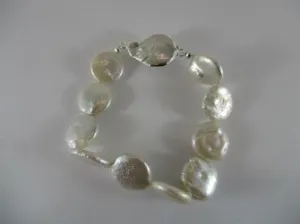 Silver coin pearl feature on stretch